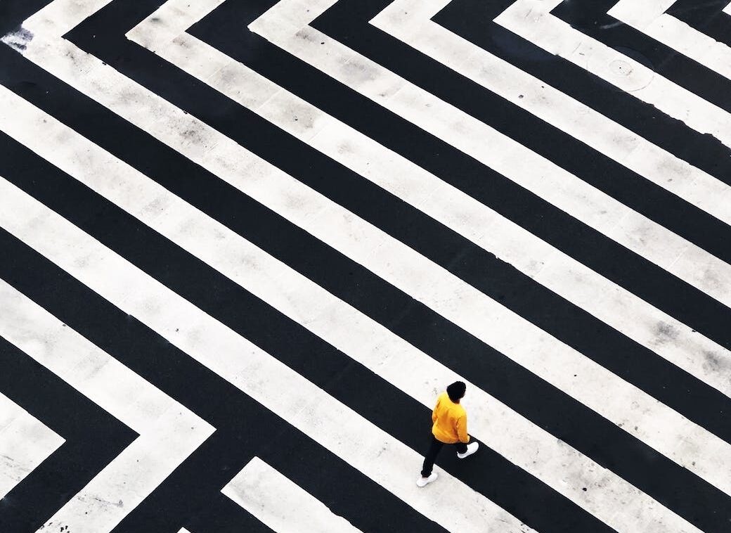 man wearing yellow jacket